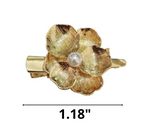 Pinzas en forma de flor dorada